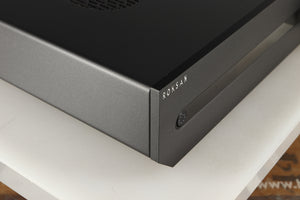Front left corner of a used Roksan Attessa Integrated Amplifier in a black finish