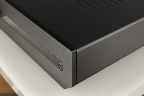 Front right corner of a used Roksan Attessa Integrated Amplifier in a black finish