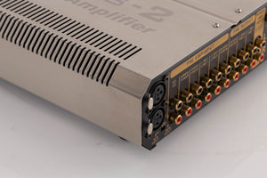 Rear left corner view of a used Roksan Caspian M2 Integrated Amplifier in Black