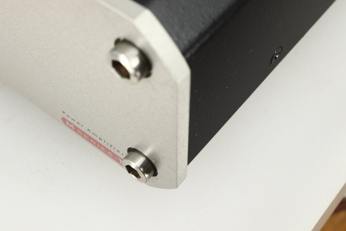 Close up of a used Roksan Caspian MSeries-1 Power Amplifier in a silver finish showing scratch on fascia