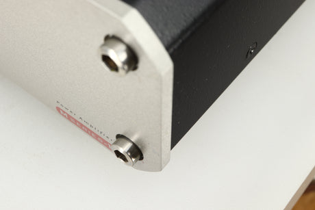 Close up of a used Roksan Caspian MSeries-1 Power Amplifier in a silver finish showing scratch on fascia
