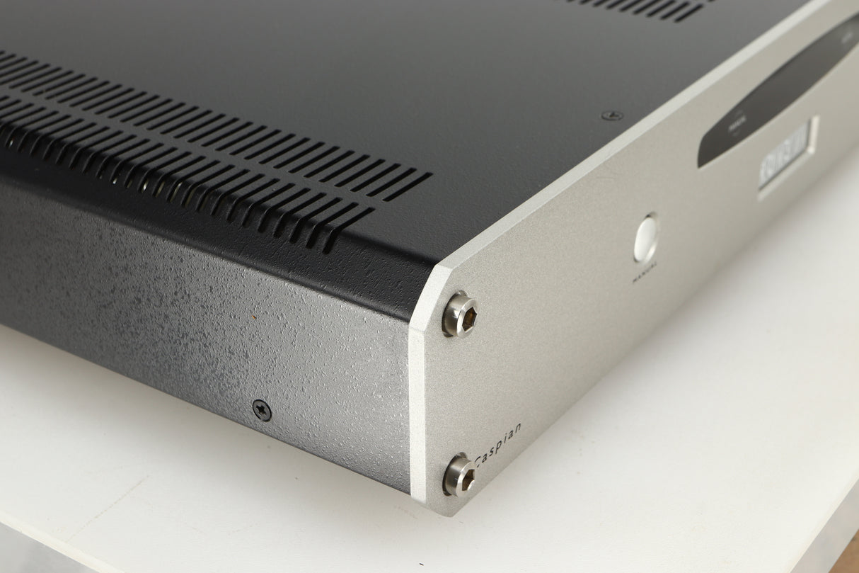 Front left corner of a used Roksan Caspian MSeries-1 Power Amplifier in a silver finish