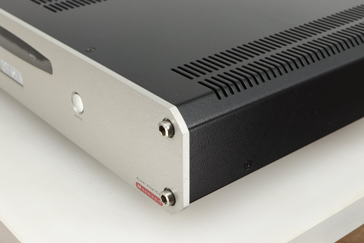 Front right corner of a used Roksan Caspian MSeries-1 Power Amplifier in a silver finish