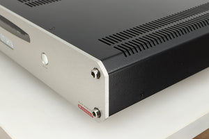 Front right corner of a used Roksan Caspian MSeries-1 Power Amplifier in a silver finish