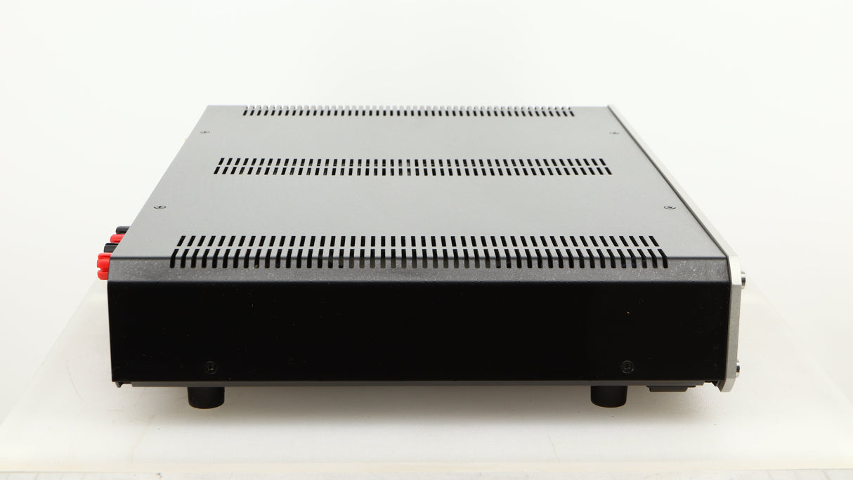 Left side view of a used Roksan Caspian MSeries-1 Power Amplifier in a silver finish