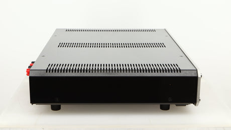 Left side view of a used Roksan Caspian MSeries-1 Power Amplifier in a silver finish