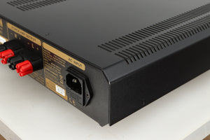 Rear left corner of a used Roksan Caspian MSeries-1 Power Amplifier in a silver finish