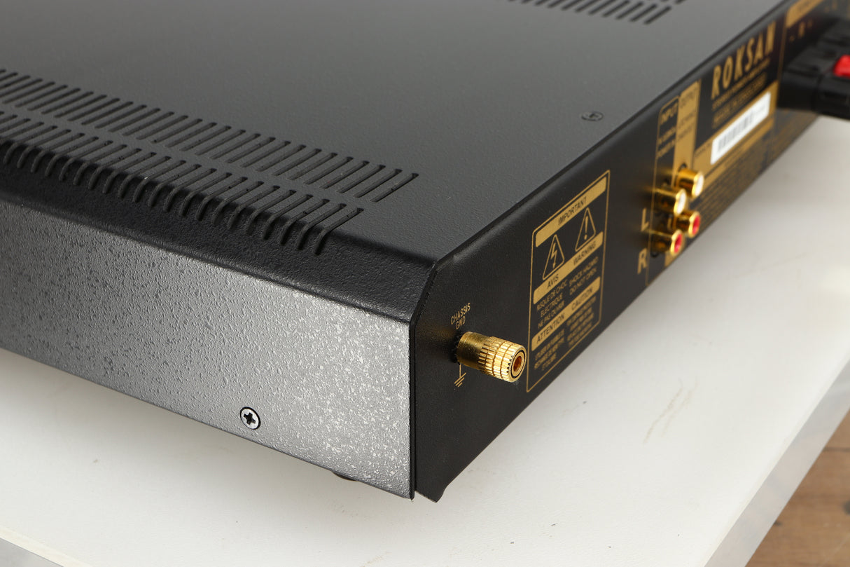 Rear right corner of a used Roksan Caspian MSeries-1 Power Amplifier in a silver finish