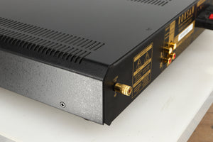 Rear right corner of a used Roksan Caspian MSeries-1 Power Amplifier in a silver finish