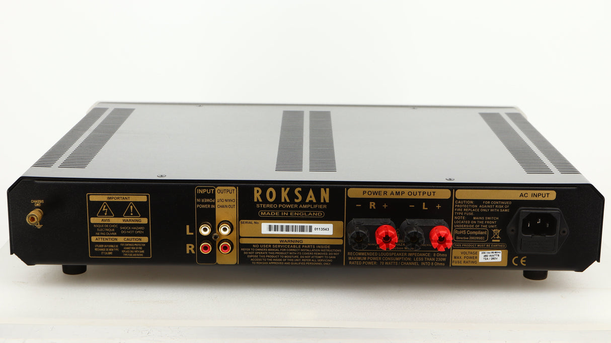 Rear view of a used Roksan Caspian MSeries-1 Power Amplifier in a silver finish showing Phono Inputs, Phono Outputs and Mains Cable