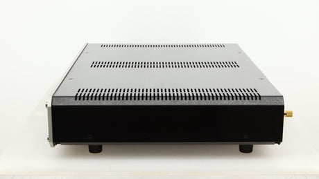 Right side view of a used Roksan Caspian MSeries-1 Power Amplifier in a silver finish
