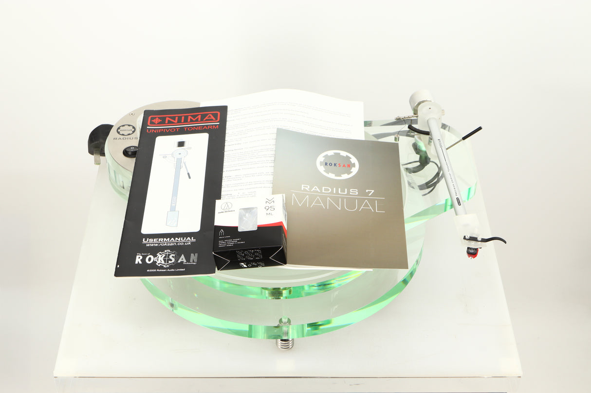 Front view of a used Roksan Radius 7 Turntable / T-VM95ML Cartridge showing 2x Manuals