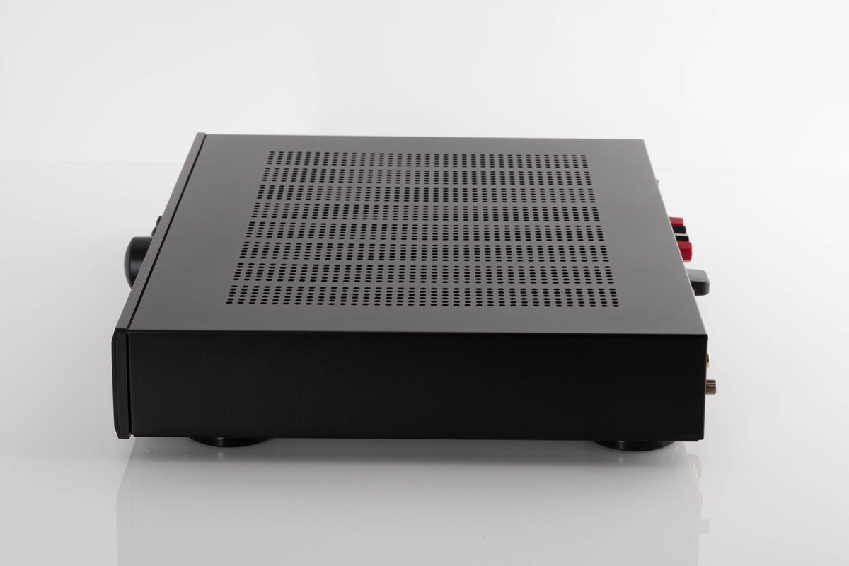 Side view of a used Rotel A11MKII Integrated Amplifier