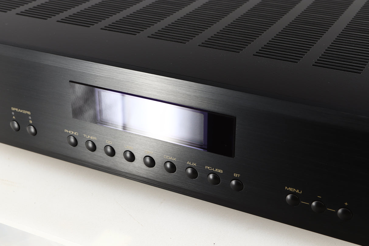 Close up of a used Rotel A14 MKII Integrated Amplifier in a black finish showing the screen