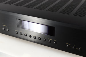 Close up of a used Rotel A14 MKII Integrated Amplifier in a black finish showing the screen