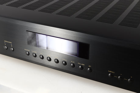 Close up of a used Rotel A14 MKII Integrated Amplifier in a black finish showing the screen