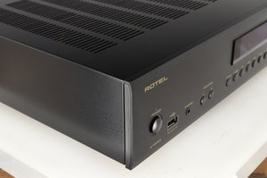 Front left corner of a used Rotel A14 MKII Integrated Amplifier in a black finish