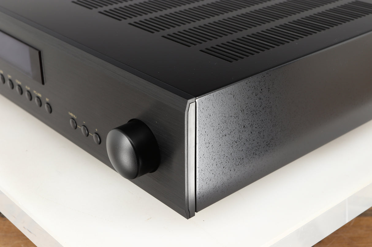 Front right corner of a used Rotel A14 MKII Integrated Amplifier in a black finish