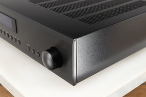 Front right corner of a used Rotel A14 MKII Integrated Amplifier in a black finish