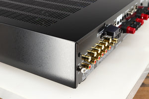 Rear right corner of a used Rotel A14 MKII Integrated Amplifier in a black finish