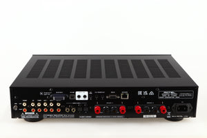 Rear view of a used Rotel A14 MKII Integrated Amplifier in a black finish showing Phono Inputs, Optical Inputs, Speaker Inputs and Mains Input