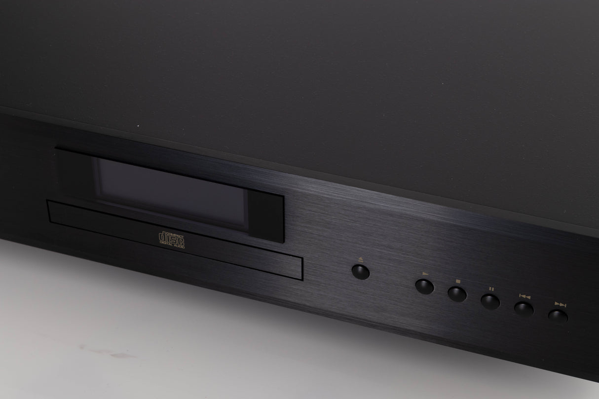 Close up of a used Rotel CD11 MKII CD Player in a Black finish showing some of the fascia