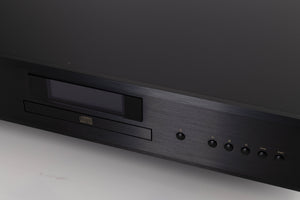 Close up of a used Rotel CD11 MKII CD Player in a Black finish showing some of the fascia
