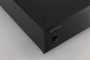 Front left corner of a used Rotel CD11 MKII CD Player in a Black finish