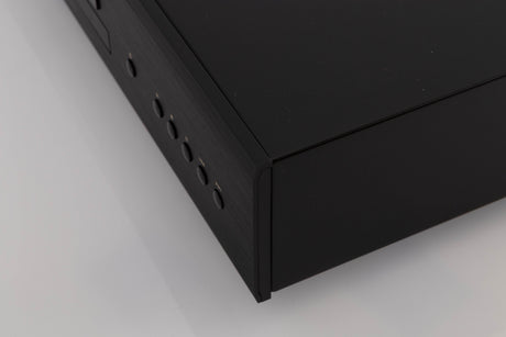 Front right corner of a used Rotel CD11 MKII CD Player in a Black finish