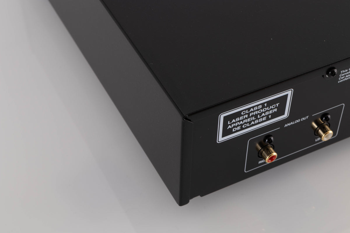 Rear right corner of a used Rotel CD11 MKII CD Player in a Black finish