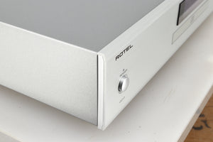 Front left corner of a used Rotel CD11 Tribute CD Player in a silver finish