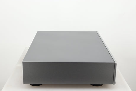 Left side view of a used Rotel CD11 Tribute CD Player in a silver finish