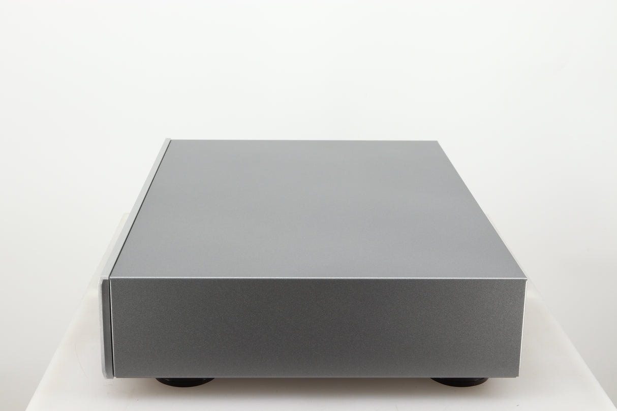 Right side view of a used Rotel CD11 Tribute CD Player in a silver finish