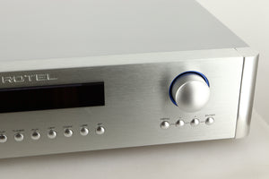 Close up view of a used Rotel RC-1572 MKII Pre Amplifier in Silver finish