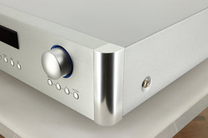Front right corner view of a used Rotel RC-1572 MKII Pre Amplifier in Silver finish