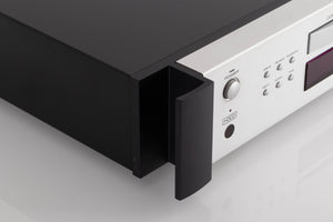Front left corner view of a used Rotel RCD-1072 CD Player in Silver