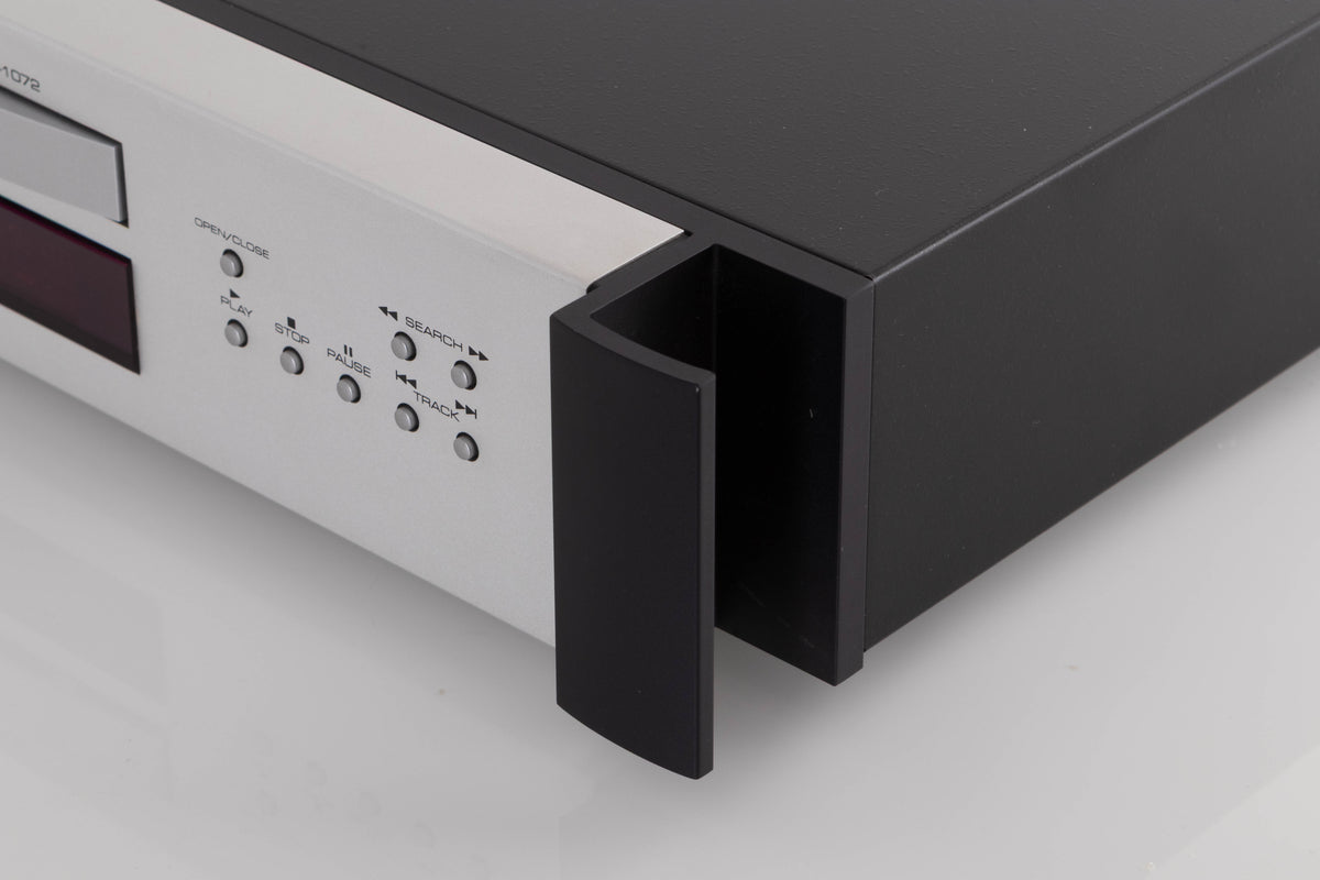 Front right corner view of a used Rotel RCD-1072 CD Player in Silver