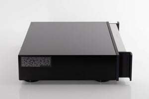 Side view of a used Rotel RCD-1072 CD Player in Silver
