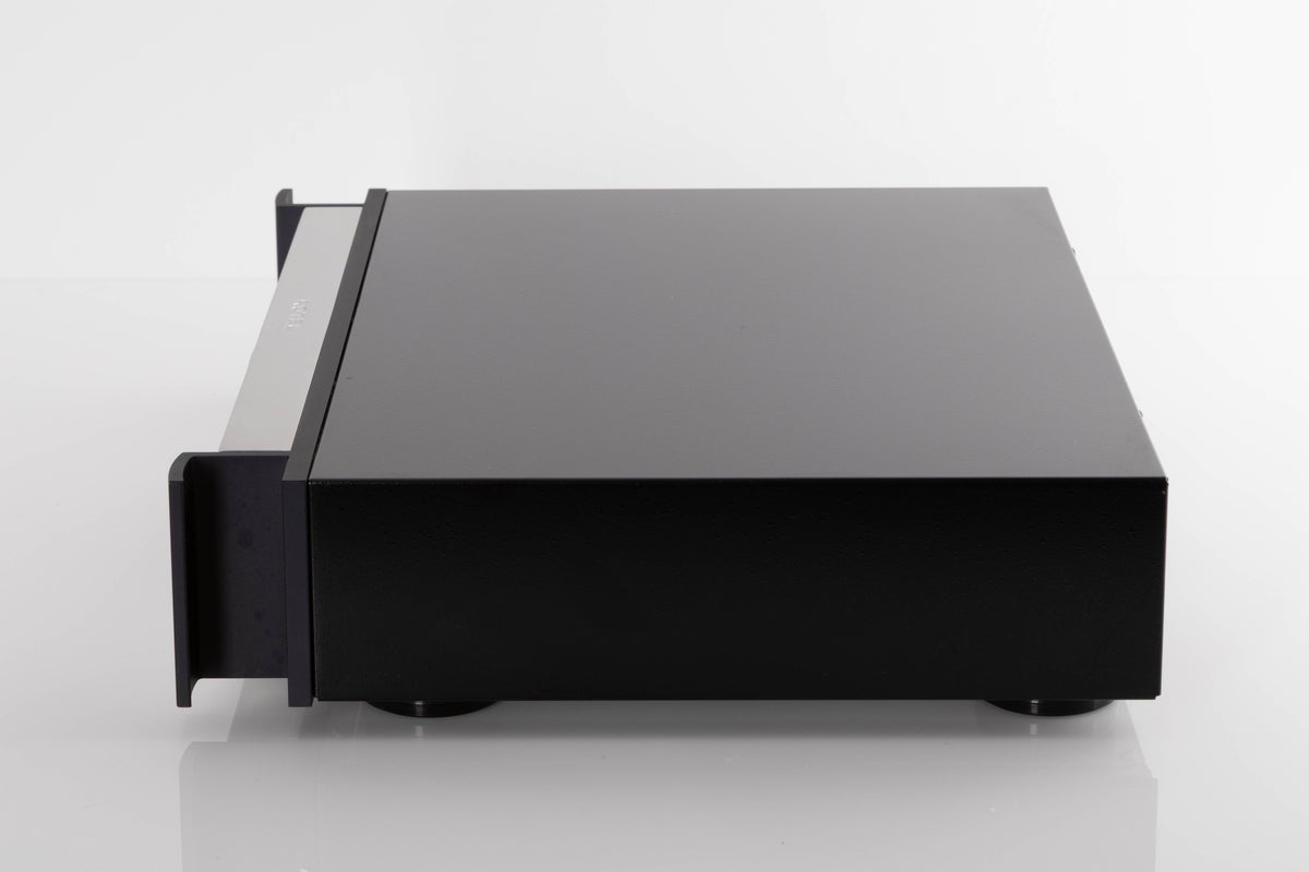Side view of a used Rotel RCD-1072 CD Player in Silver