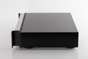 Side view of a used Rotel RCD-1072 CD Player in Silver
