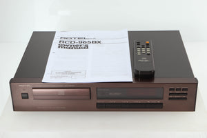 Front view of a used Rotel RCD-965BX CD Player with manual, and remote