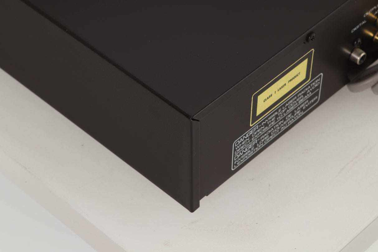 Rear left corner view of a used Rotel RCD-965BX CD Player
