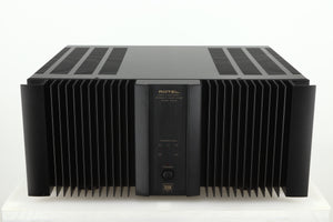 Front view of a used Rotel RMB1075 Power Amplifier in a black finish 