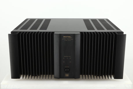 Front view of a used Rotel RMB1075 Power Amplifier in a black finish 
