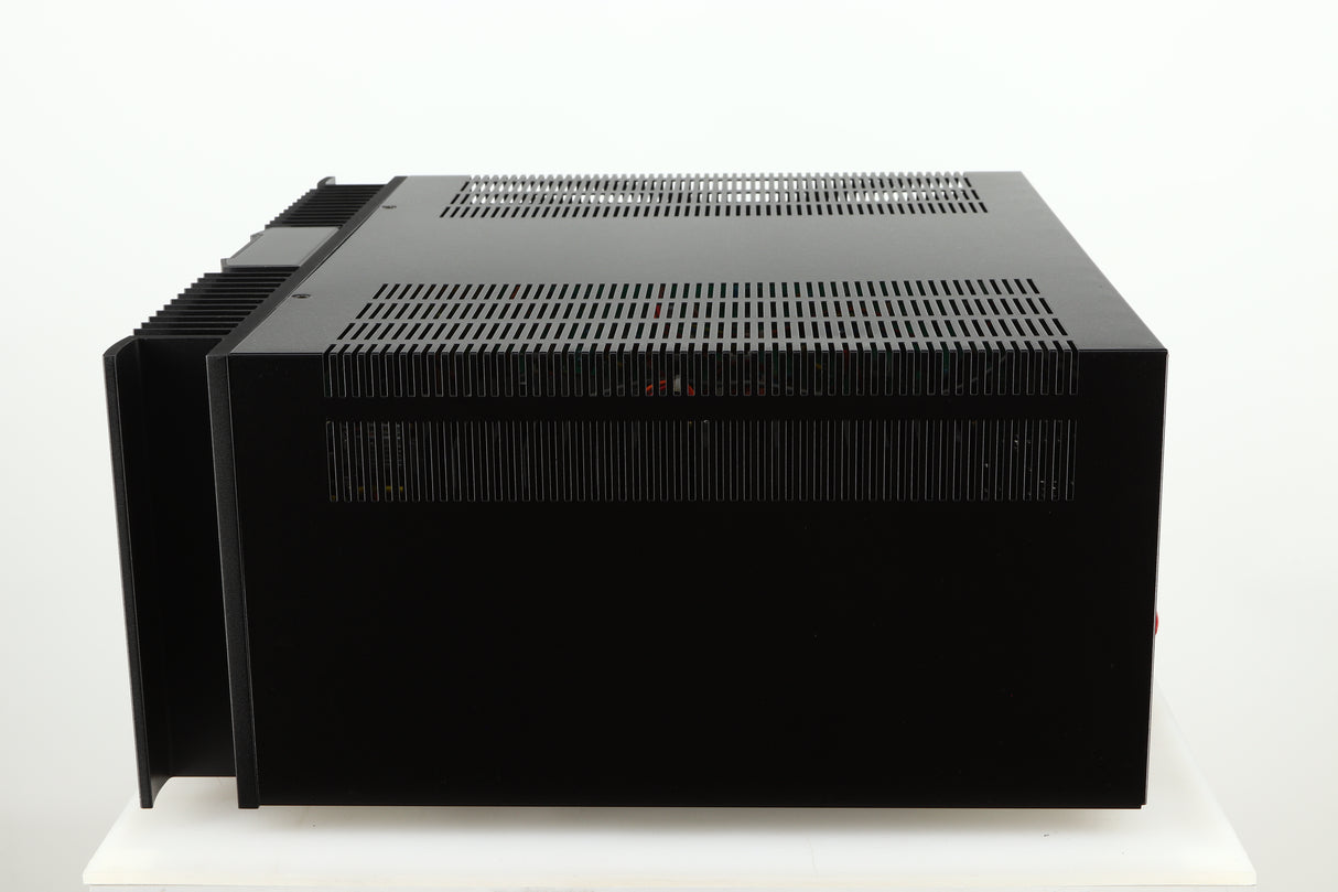 Right side view of a used Rotel RMB1075 Power Amplifier in a black finish 