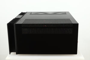 Right side view of a used Rotel RMB1075 Power Amplifier in a black finish 