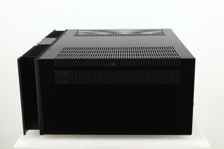 Right side view of a used Rotel RMB1075 Power Amplifier in a black finish 