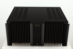 Top view of a used Rotel RMB1075 Power Amplifier in a black finish 