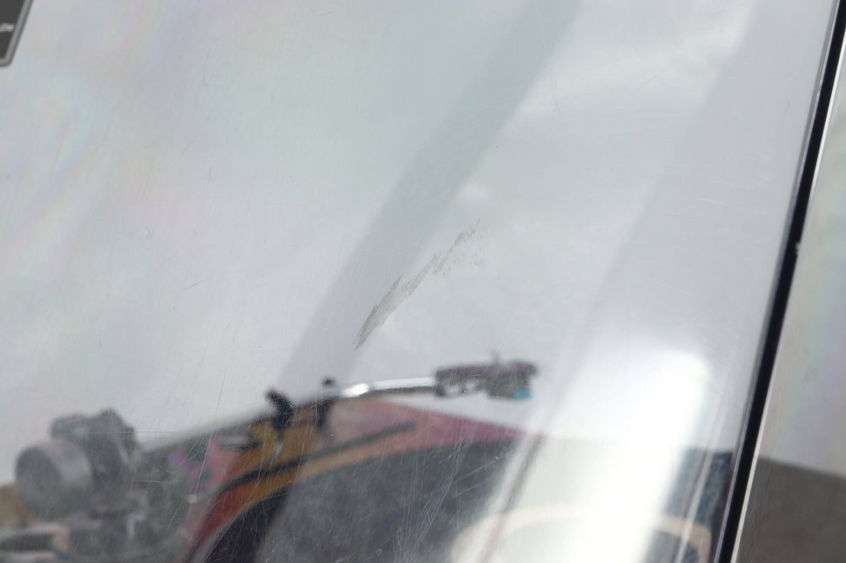 Close up of a used Rotel RP-3000 Turntable W/ SME 3009 Series II Improved Tonearm showing scratching on lid