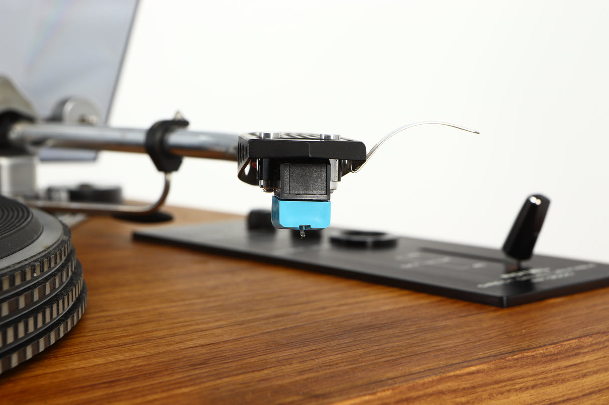 Close up of a used Rotel RP-3000 Turntable W/ SME 3009 Series II Improved Tonearm showing stylus